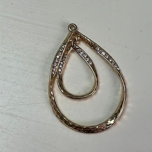 Pd6. Double oval pendant. Gold colored with rhinestones.